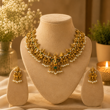 Lord Ganesha Temple Necklace Set with Green stones and Pearl  Drops
